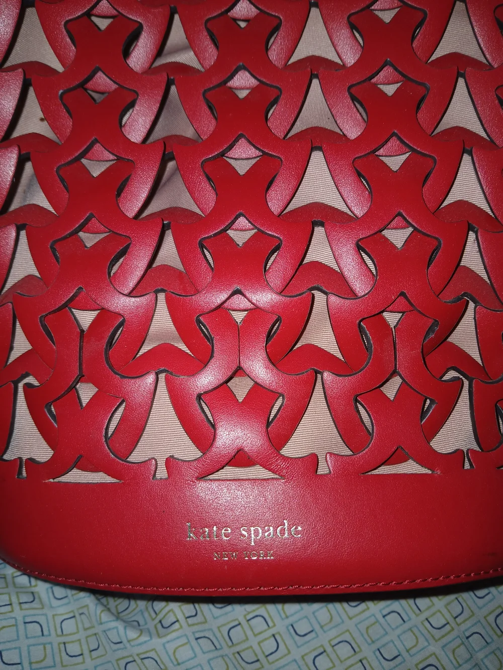 kate spade Red Cutout Leather Shoulder Bucket Bag with Cream Lining